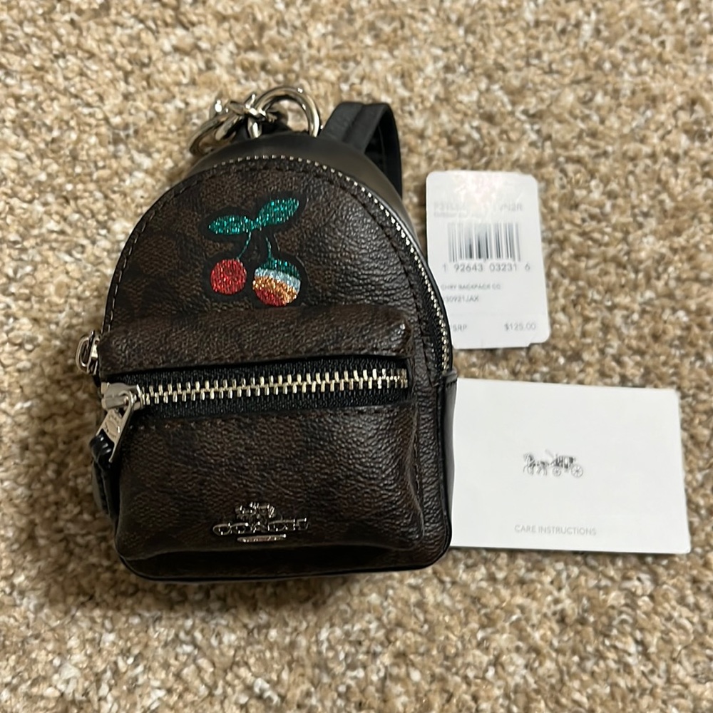 Coach bag charm backpack